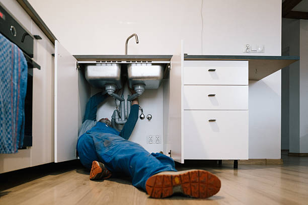 Professional Drain Cleaning technician working in Pinckney, MI